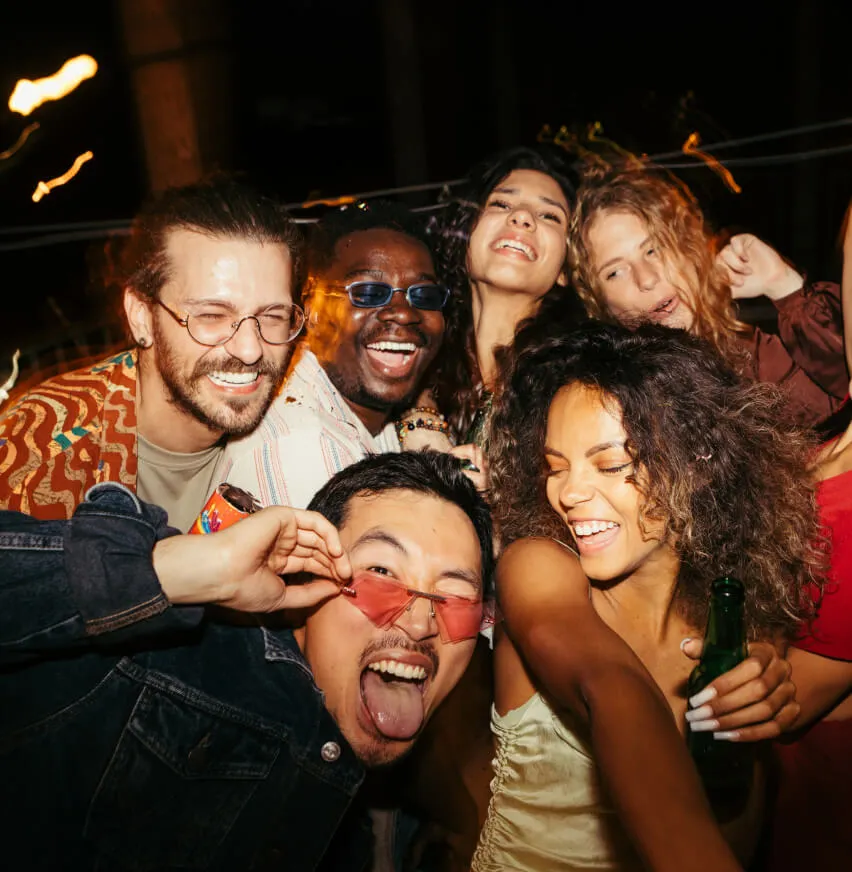 a group of people posing for a picture at an event