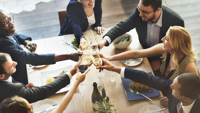 Guests toasting at a corporate cocktail reception